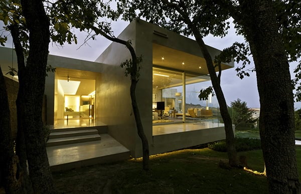 view to the back Marble-L-Shaped-Modern-Mansion-with-Amazing-Backyard-Landscaping